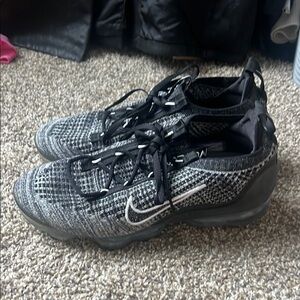 Nike Black and Gray Athletic Shoes with Textured Design